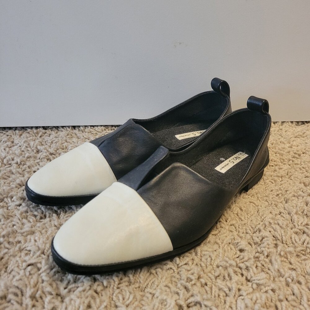 Leather black and white flats